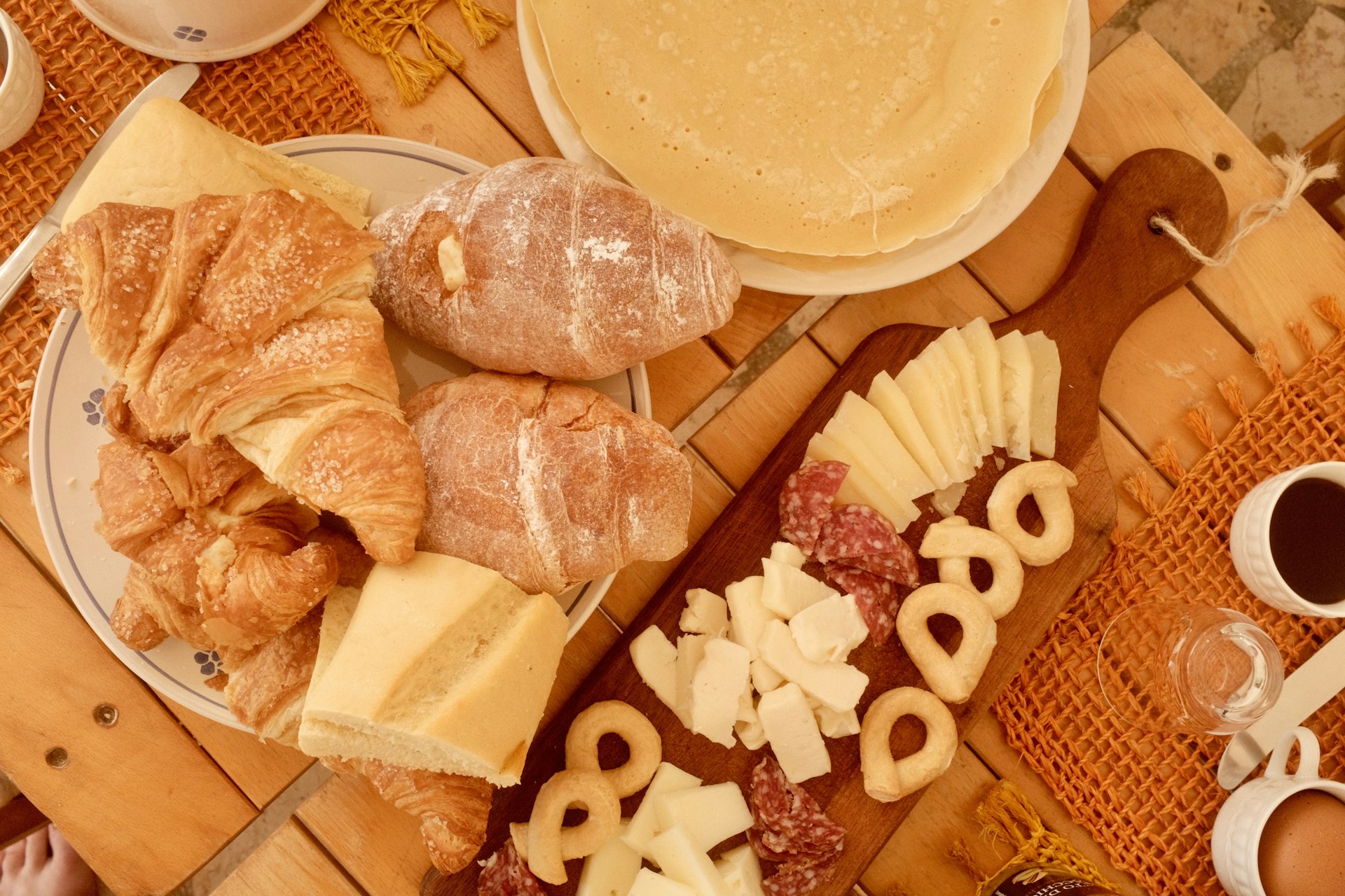A table topped with lots of different types of food